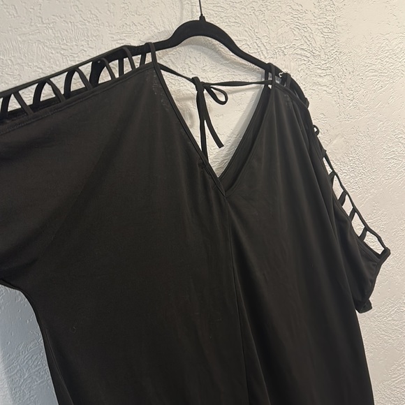 Black swim cover up with V neck in the front and back plus a tie in the back. - Picture 3 of 4